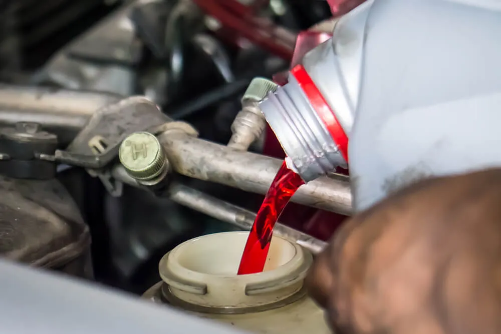 Why Do I Have Red Fluid All Over The Garage Floor?